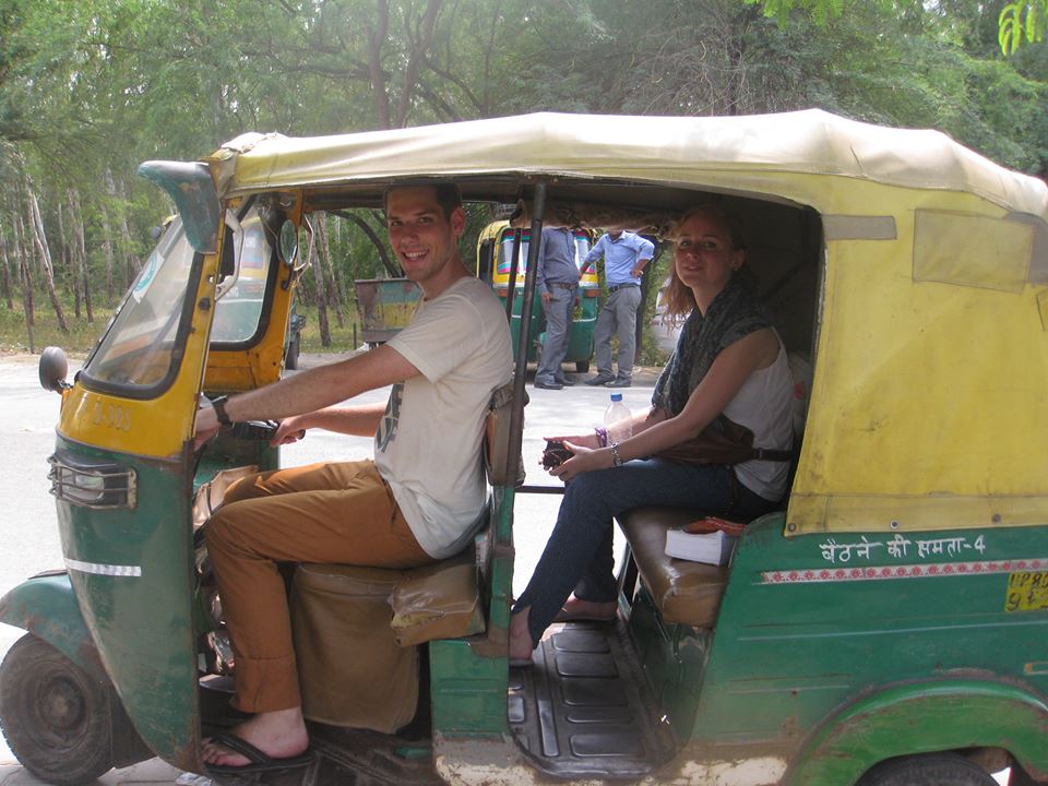 David (pretend) riding our Rickshaw, tours around Agra