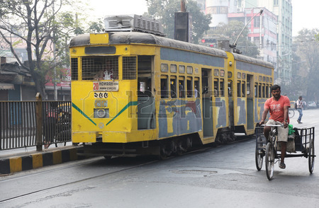 27811315-traditional-tram-downtown-kolkata-on-february-15-2014-kolkata-is-the-only-indian-city-with-a-tram-ne