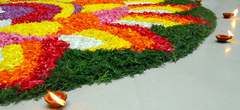 Rangoli of flowers and leaf