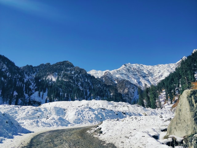 Traveling on snowy roads of Kullu 